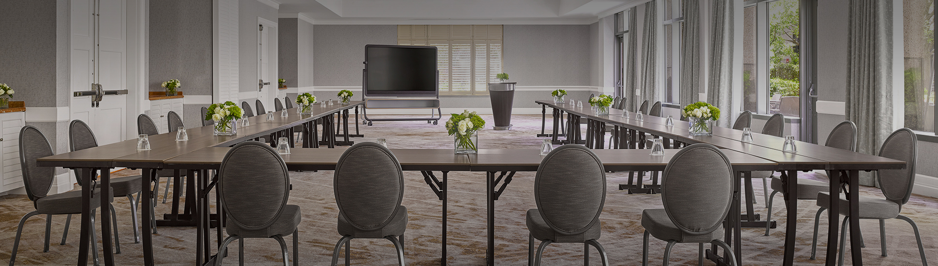 a room with tables and chairs
