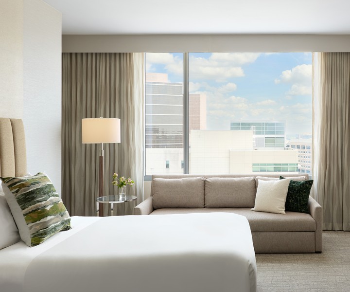 a room with a couch and a bed