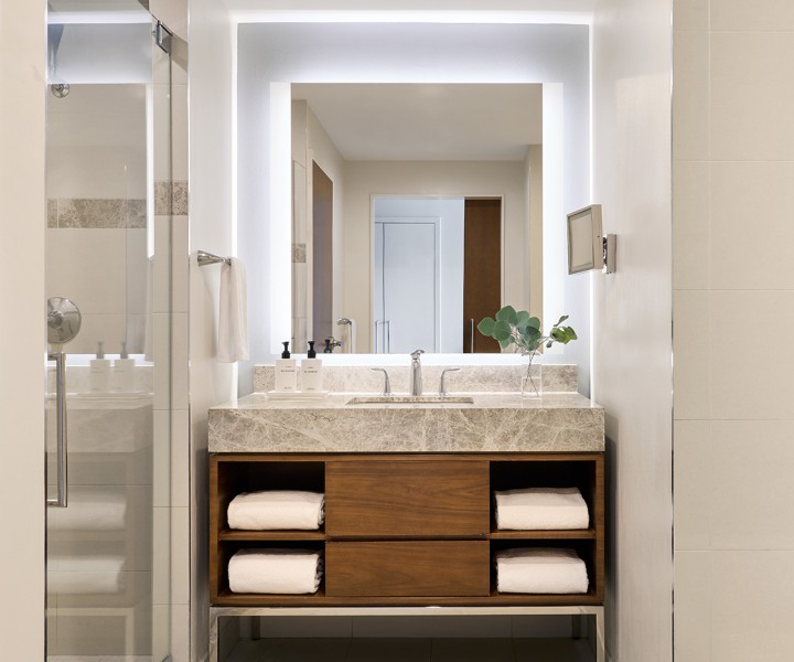 a bathroom with a sink and mirror