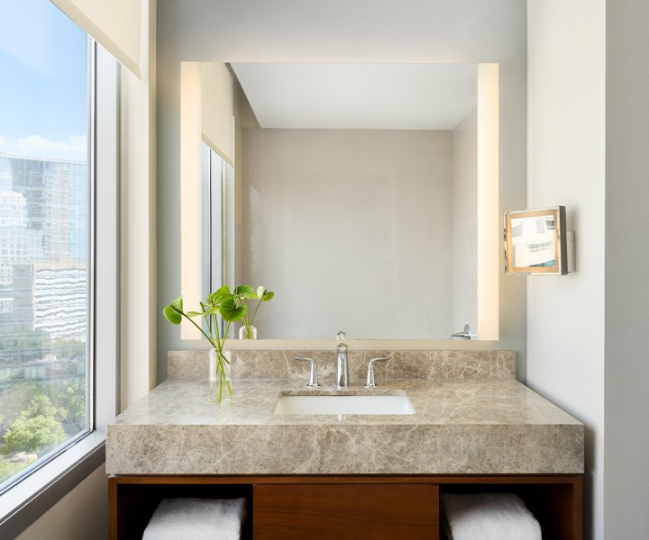 a bathroom with a sink and mirror