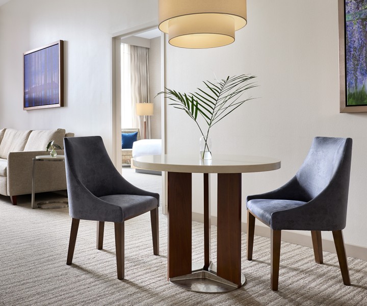 a room with a table and chairs