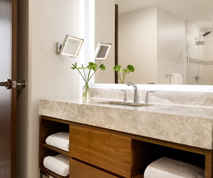 a bathroom with a sink and mirror