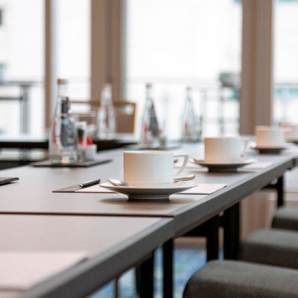 a table with cups and saucers