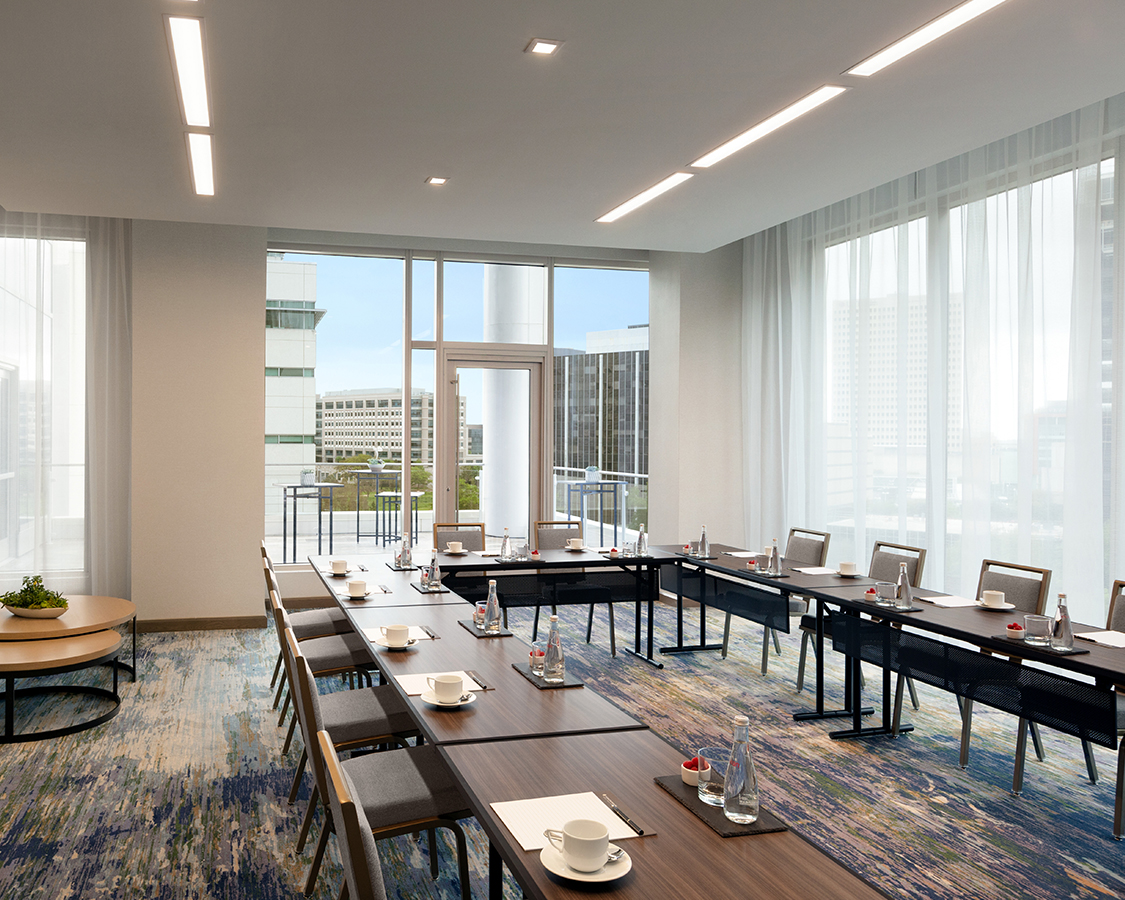 a room with tables and chairs