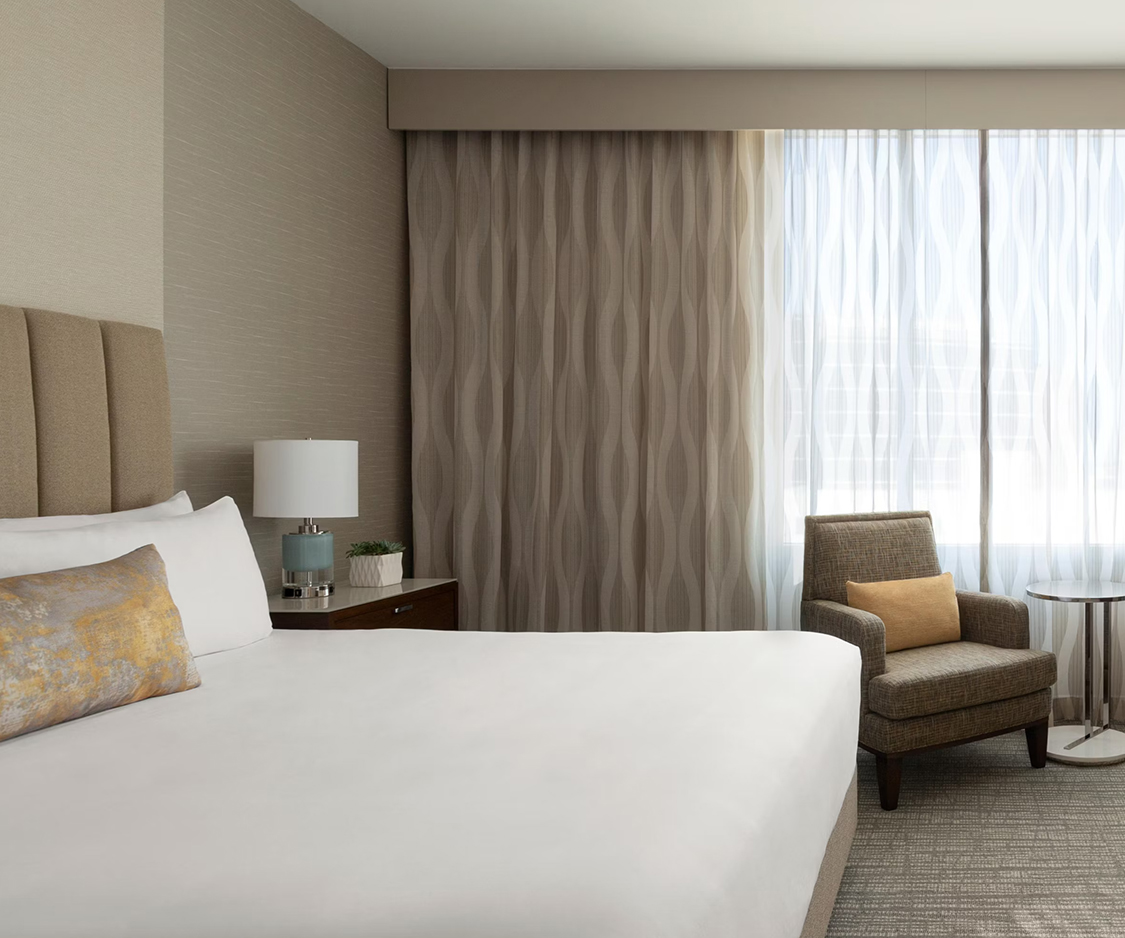 a bed in a hotel room