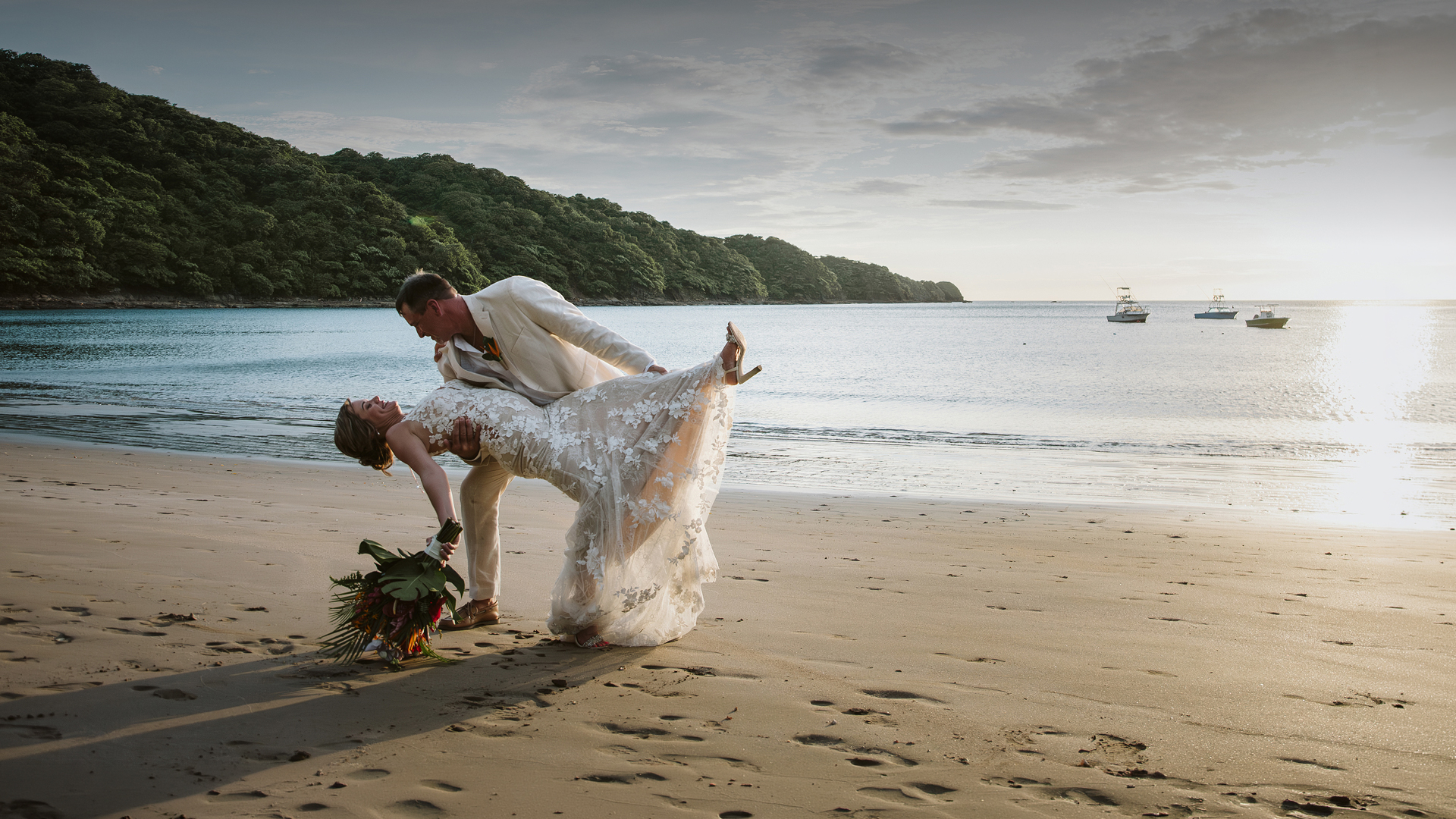a man and woman on a beach