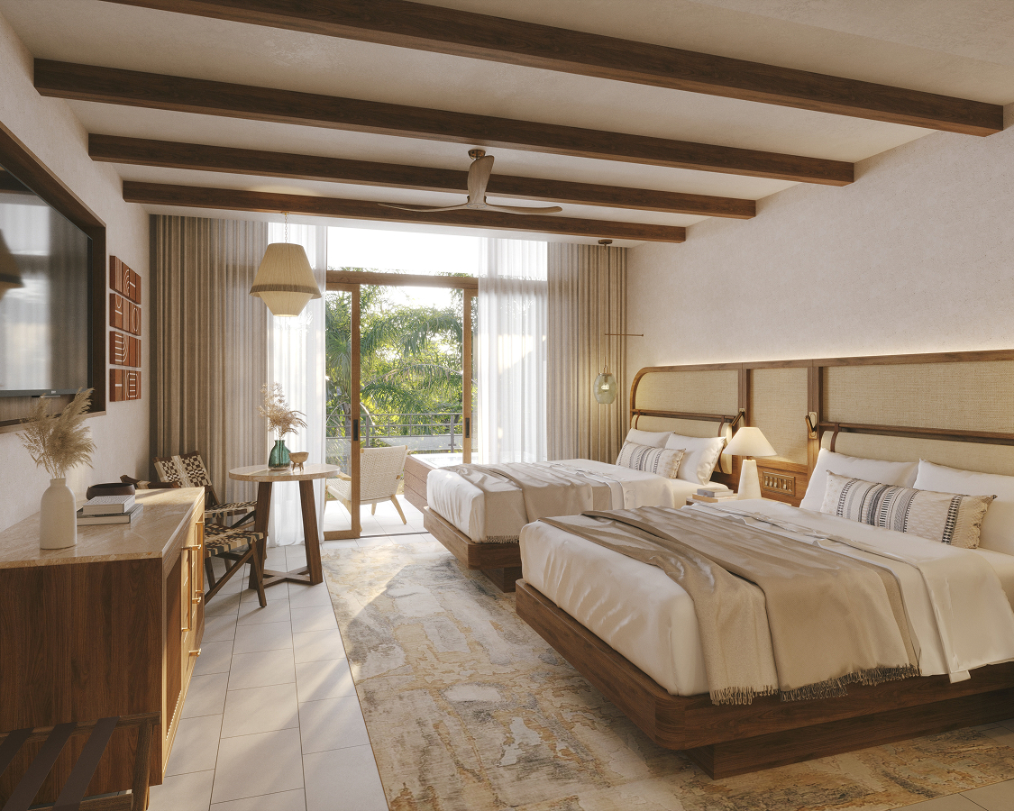 a room with two beds and a desk