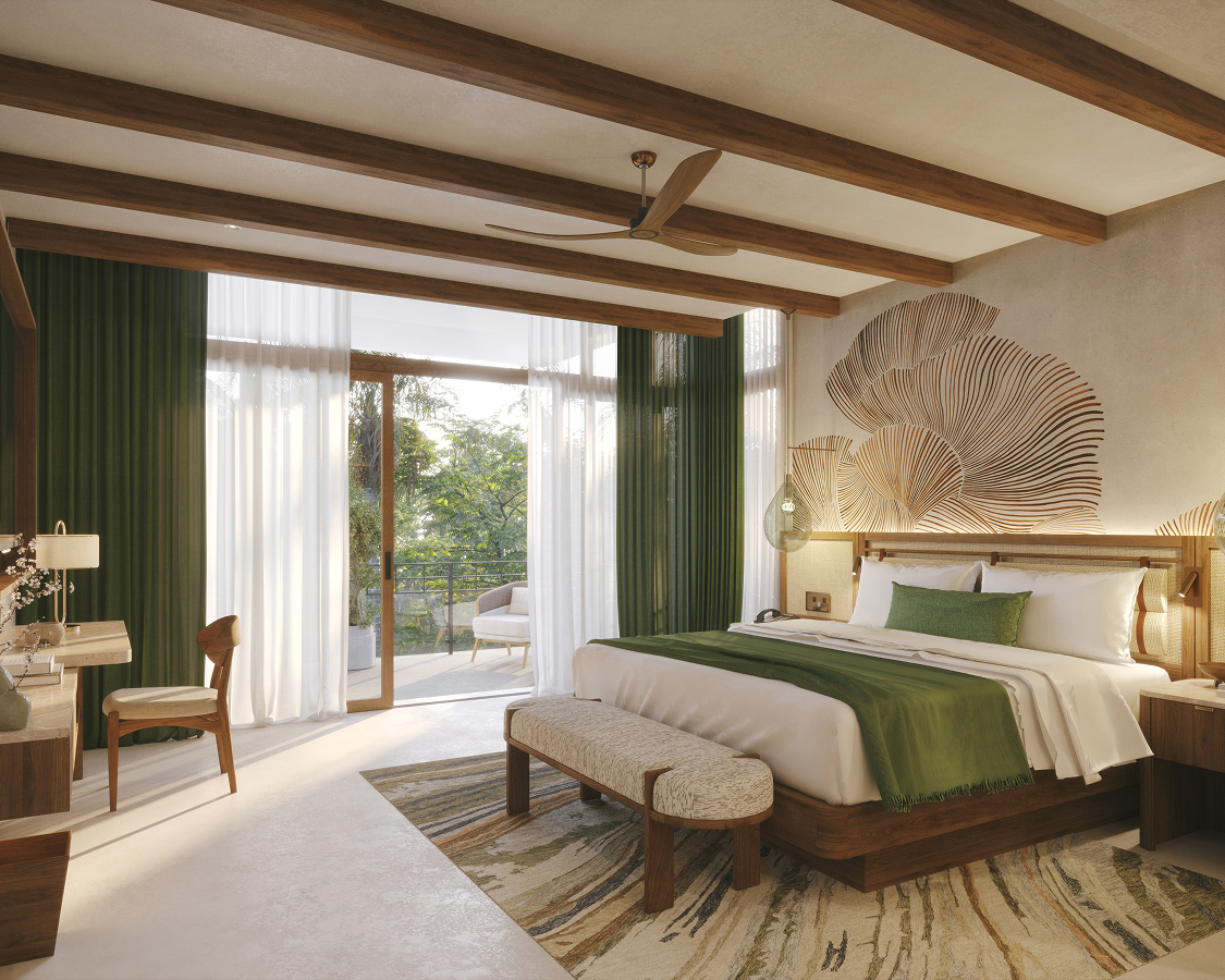 a bedroom with a bed and a chair