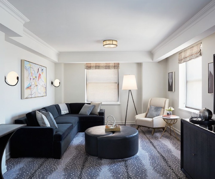 a living room with a couch and a table