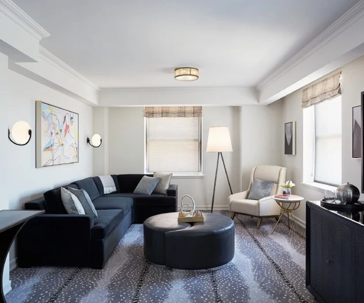 a living room with a couch and a table