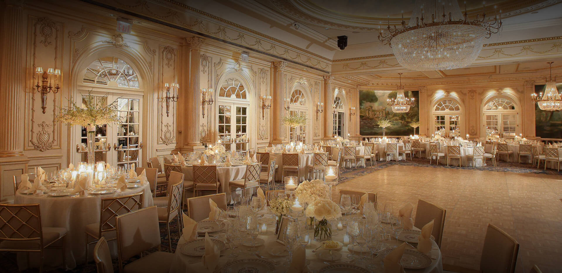 a large ballroom with tables and chairs