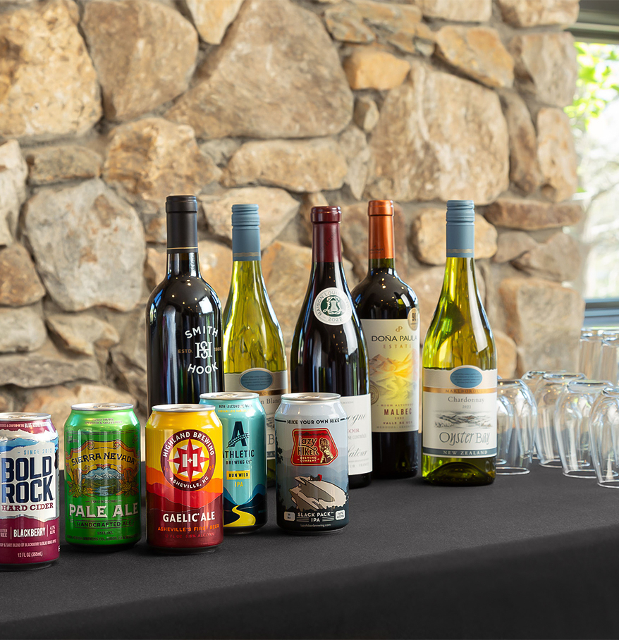 a group of bottles and cans on a table