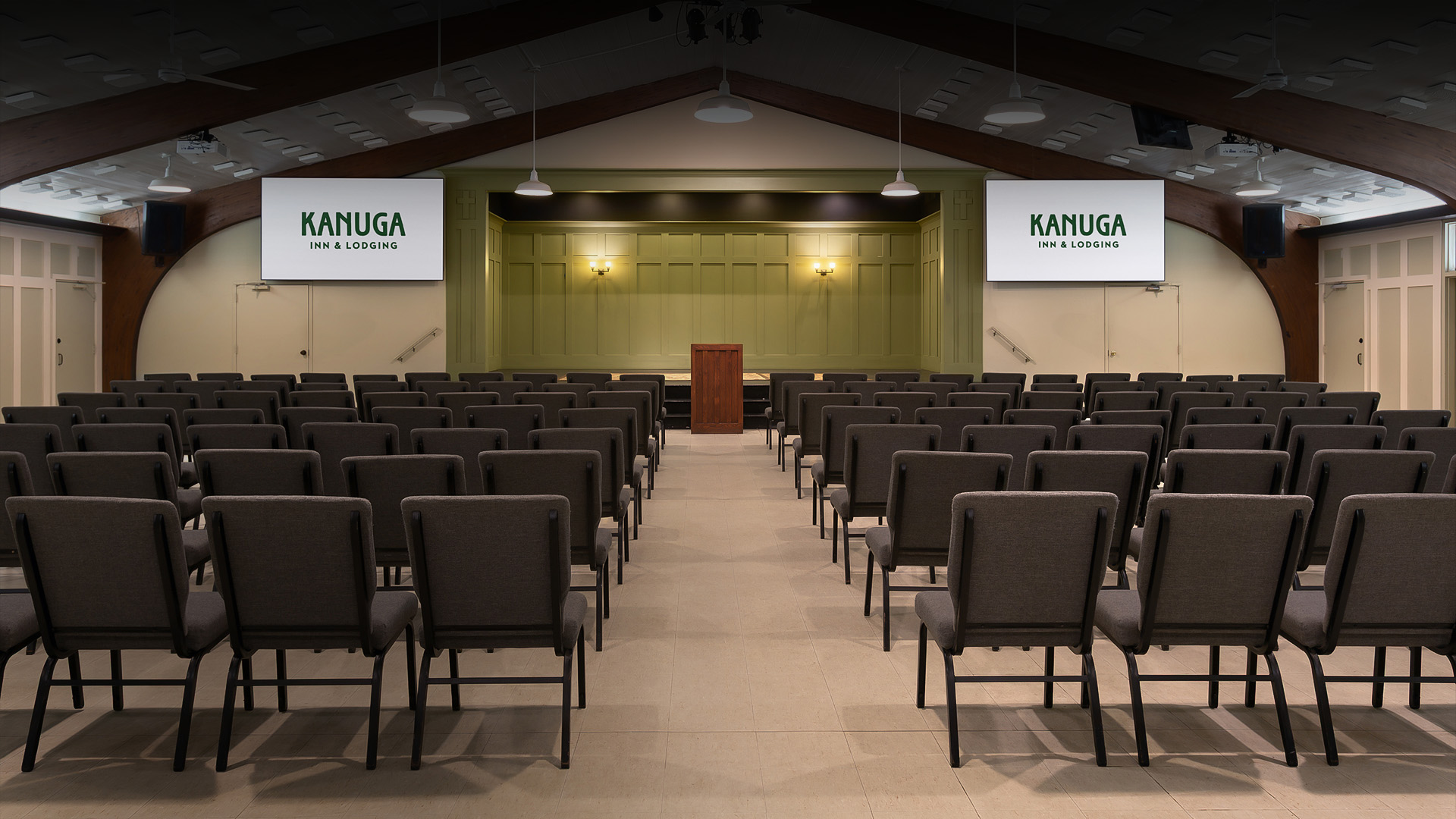 a room with chairs and a podium