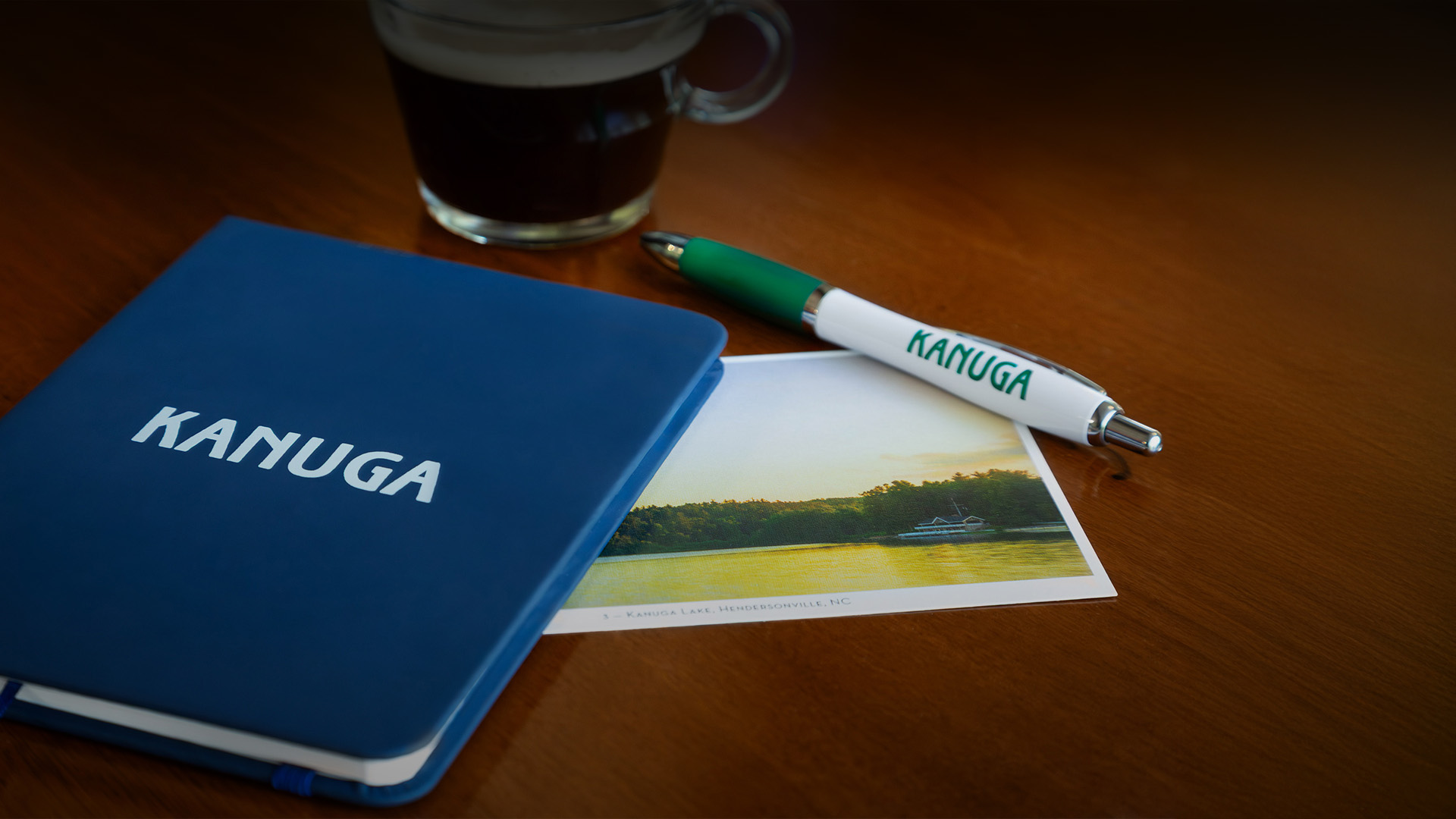 a pen and a photo on a table