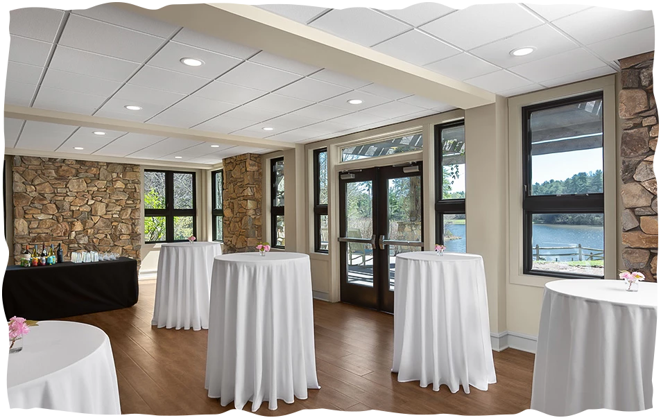 a room with tables and chairs