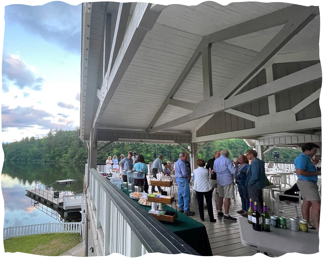 a group of people standing on a deck