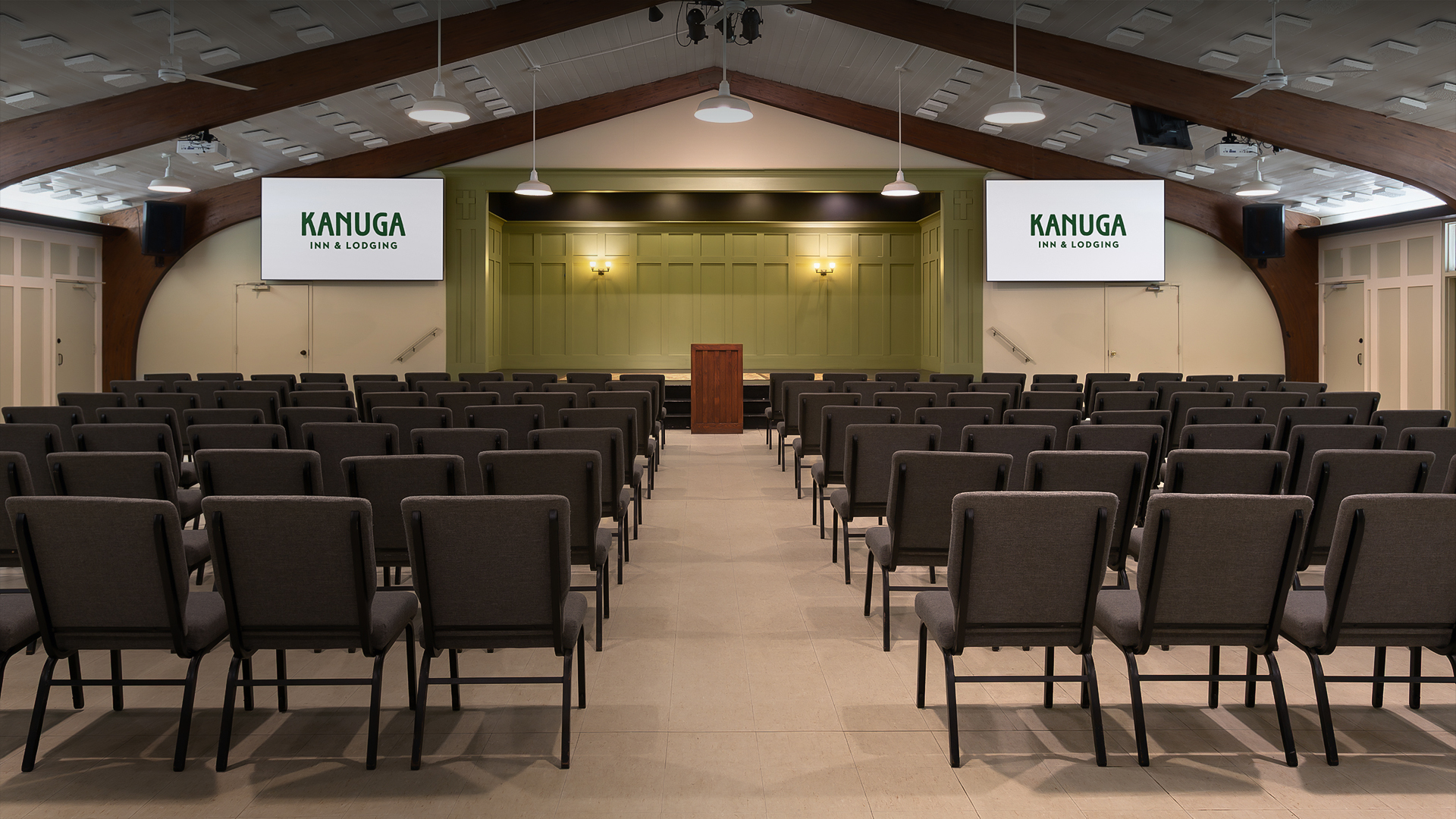 a room with chairs and a podium