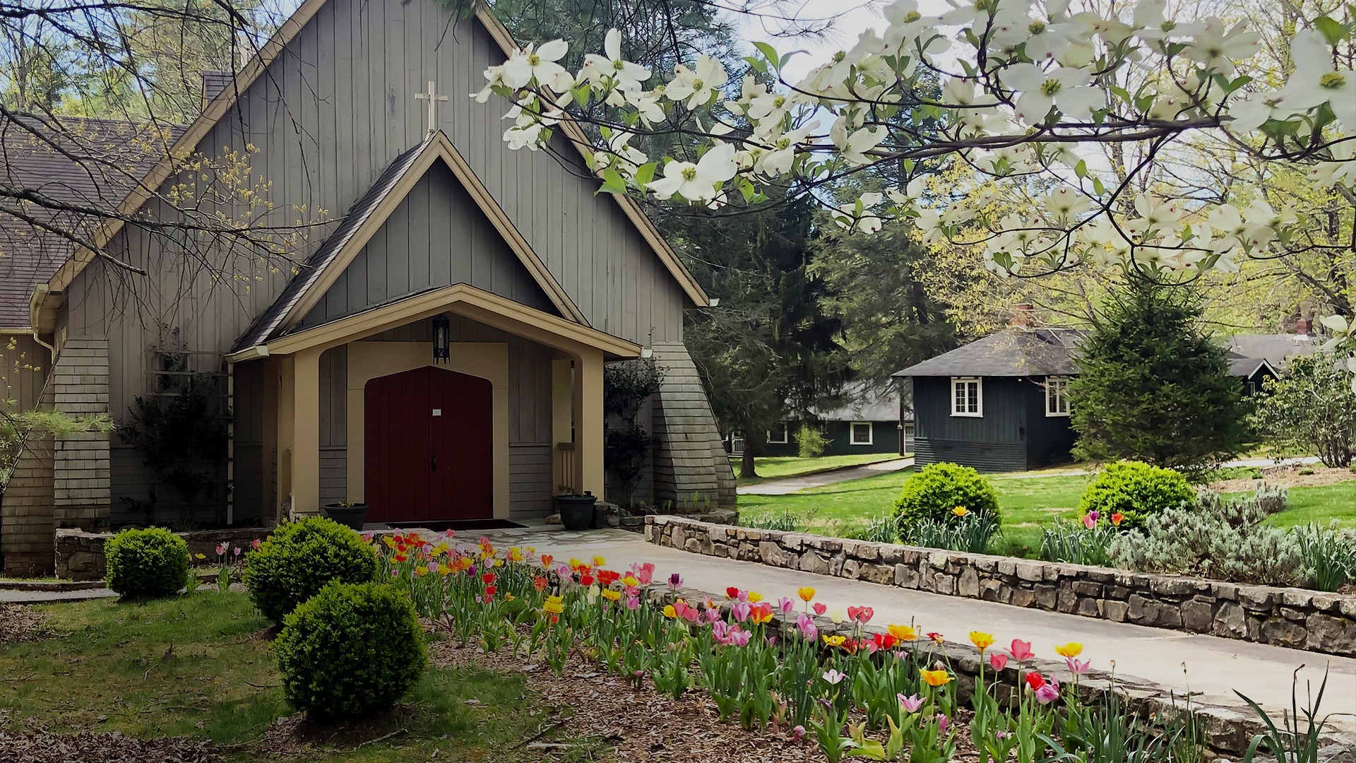 a building with flowers in front of it