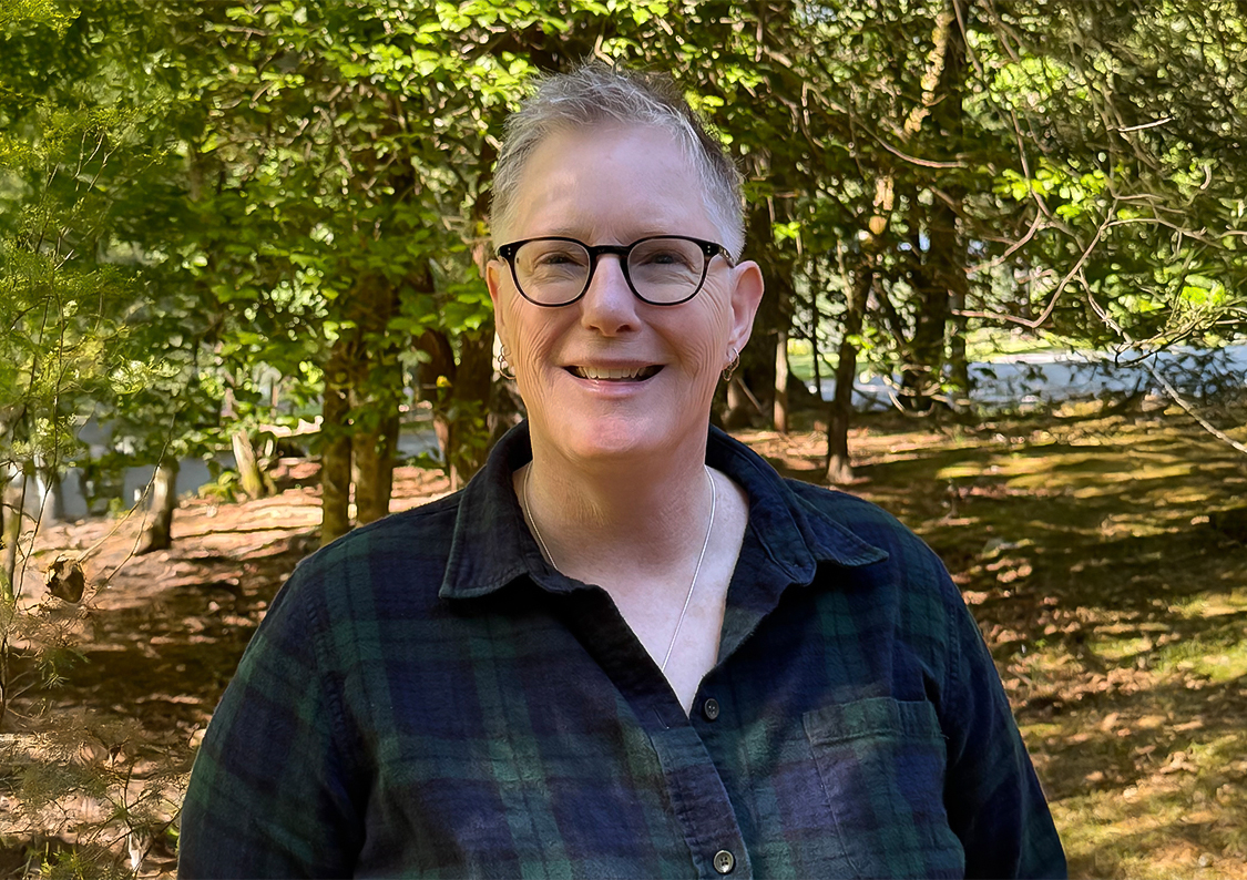 a woman smiling at camera