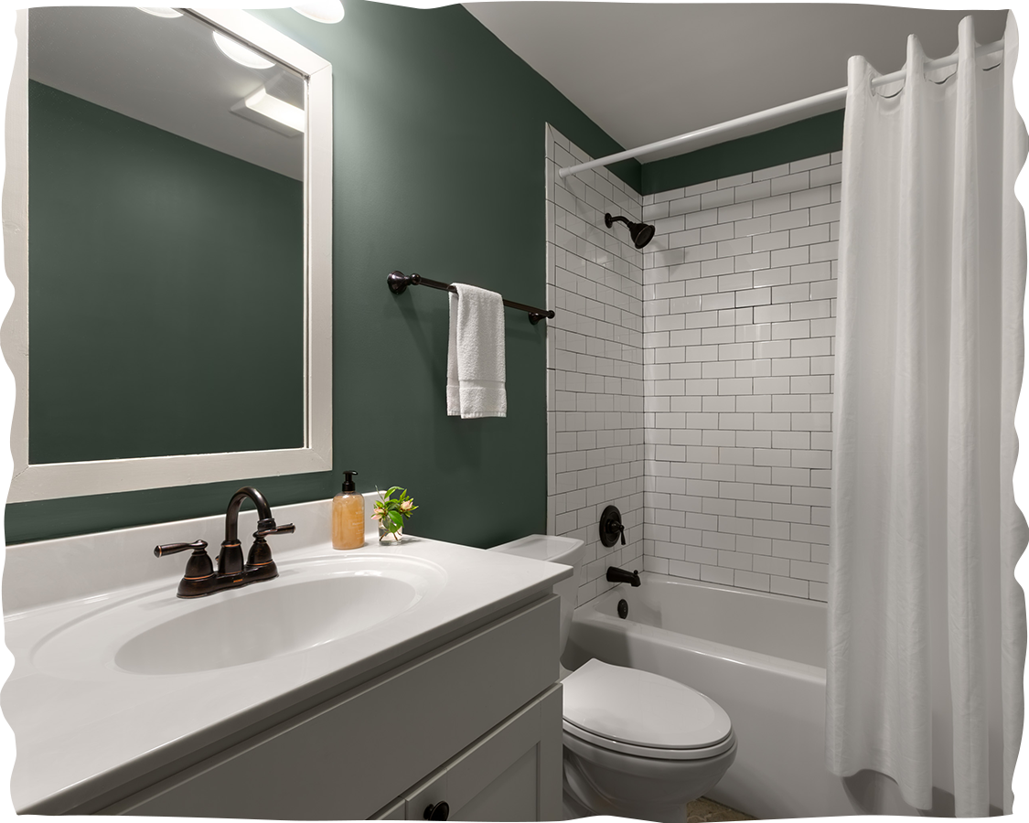 a bathroom with a sink toilet and bathtub