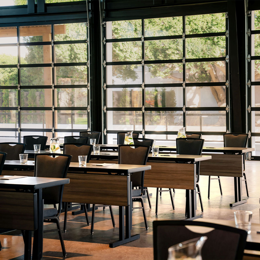 a room with tables and chairs