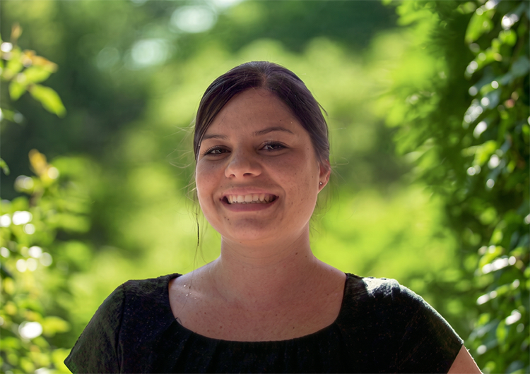 a woman smiling at camera