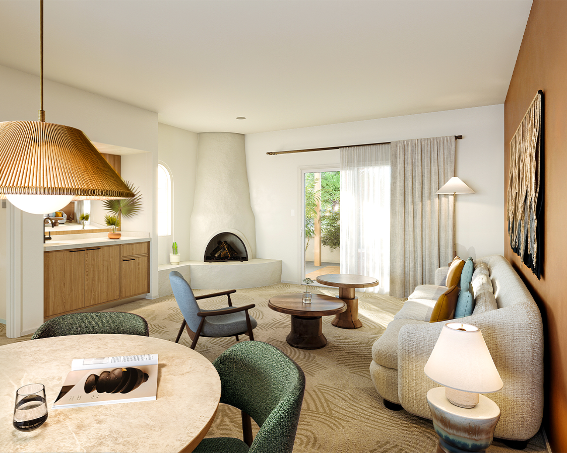 a living room with a fireplace and couches