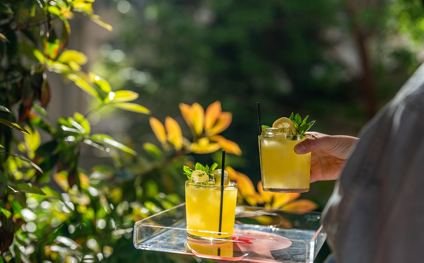 a person holding a drink