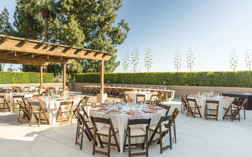 a group of tables set up for a party