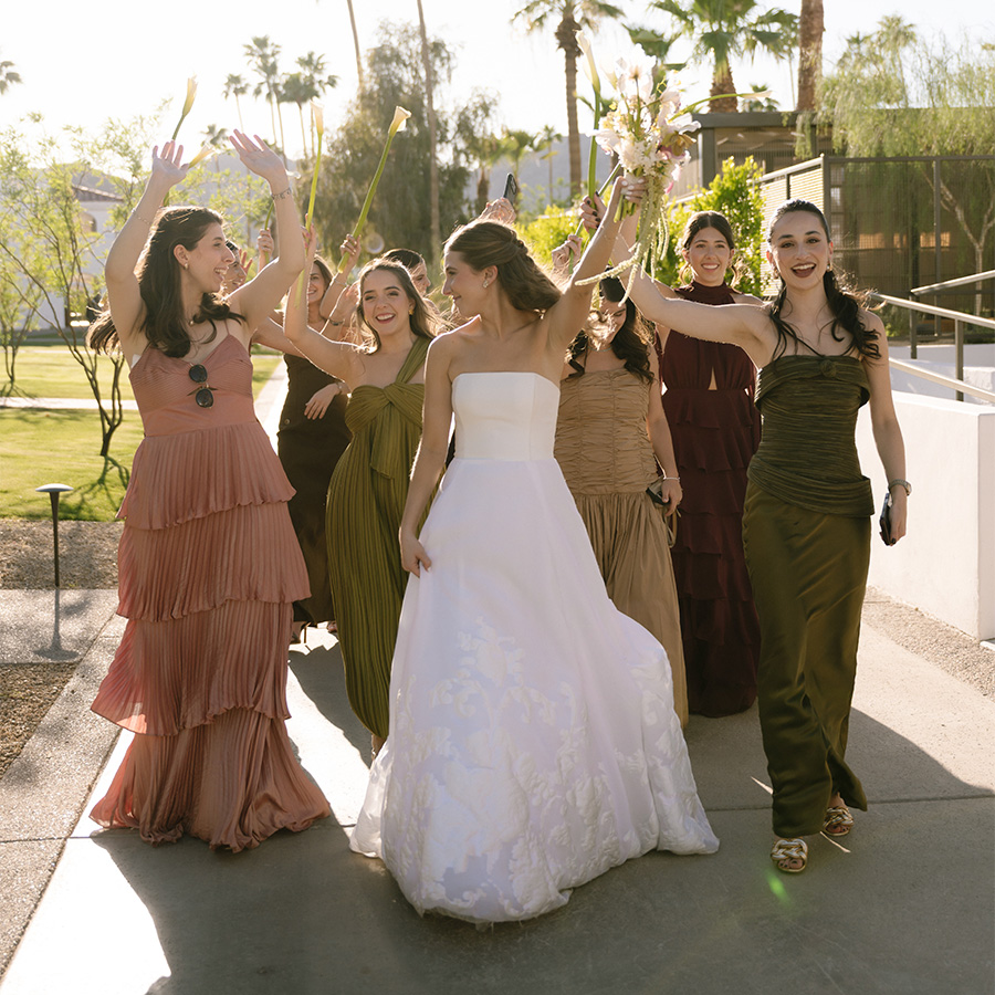 a group of women in dresses