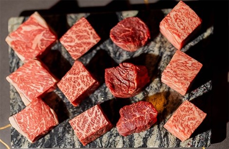 a group of red meat cubes