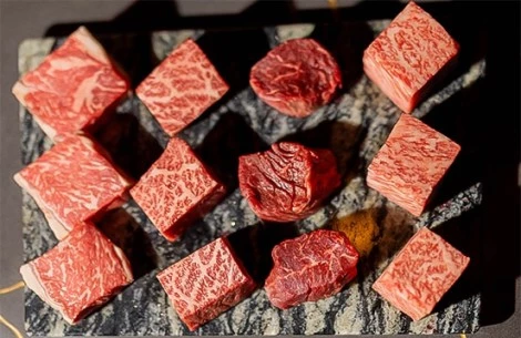 a group of red meat cubes