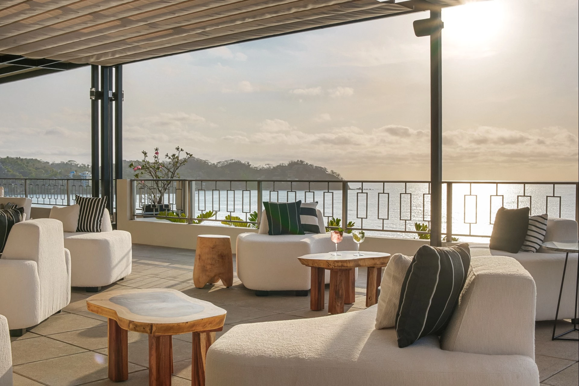 a patio with a view of the ocean