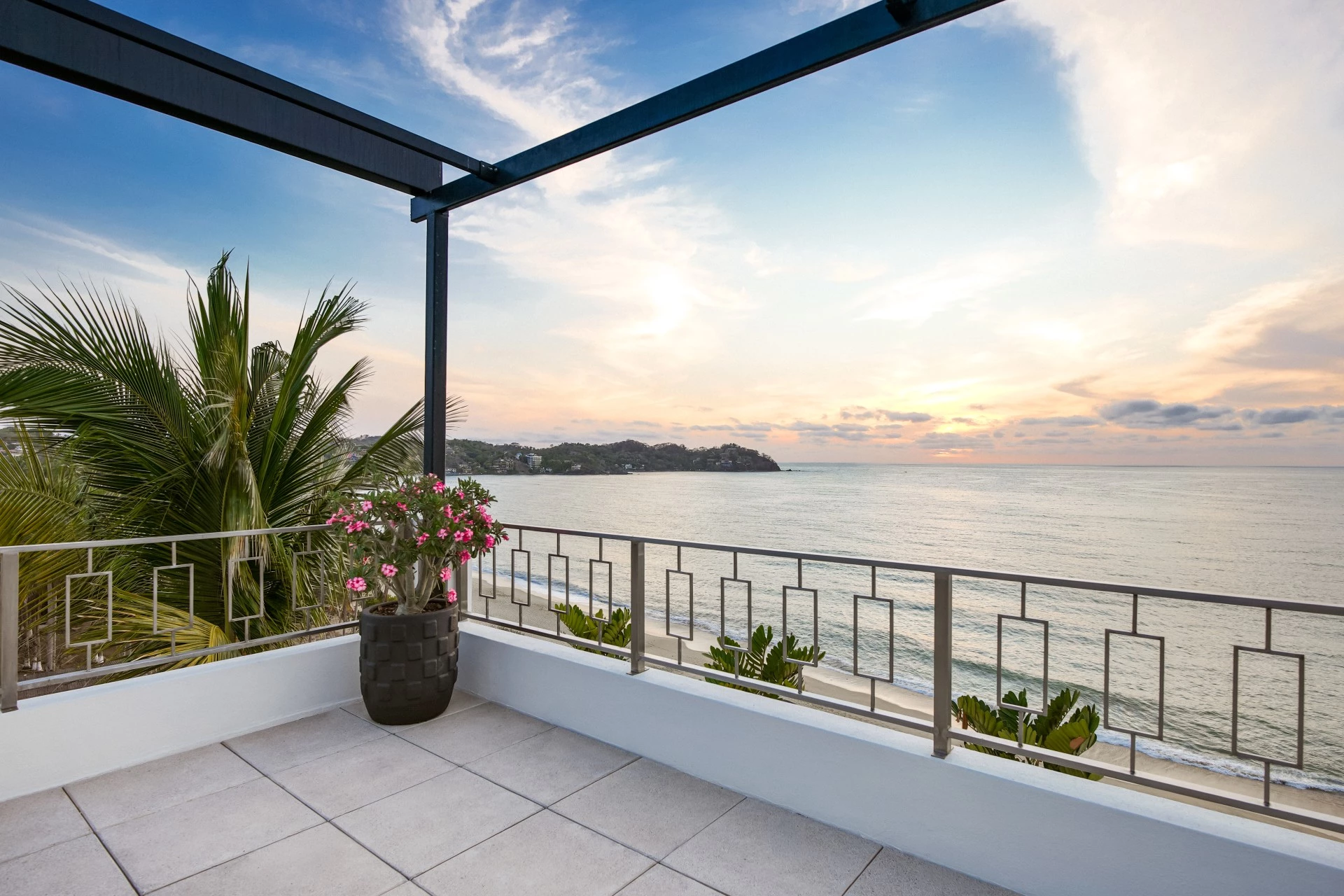 a balcony overlooking a body of water