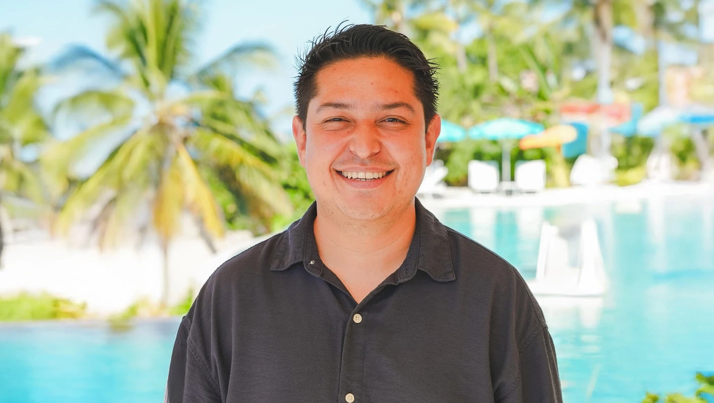 a man smiling at camera