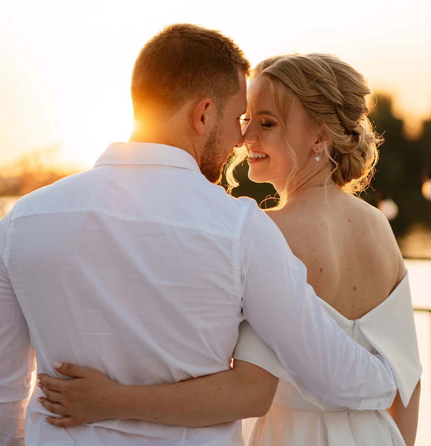 a man and woman hugging each other
