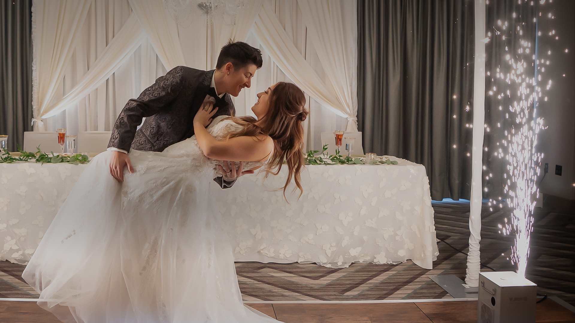 a man and woman dancing in a room