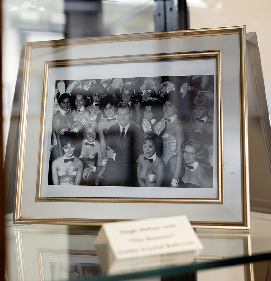 a framed photo of a group of people