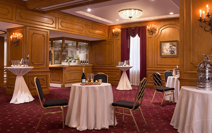 a room with tables and chairs