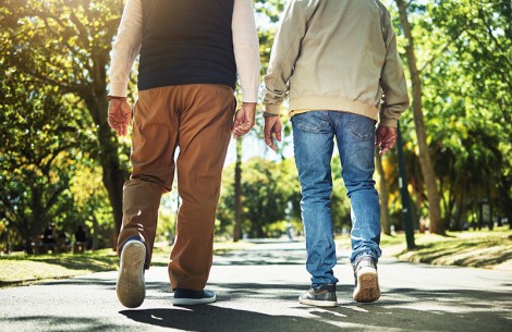 two men walking on a path