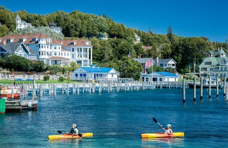 people kayaking on a lake