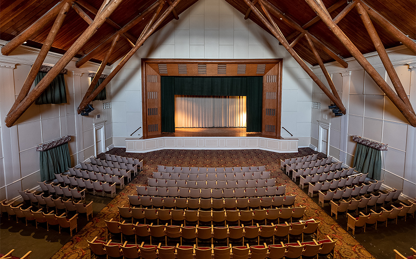 a theater with rows of chairs