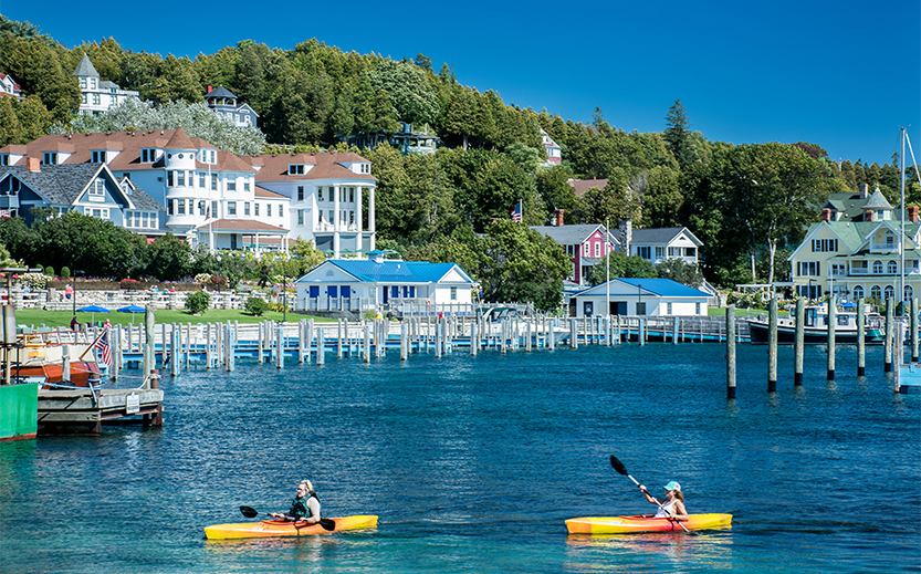 people kayaking on a lake