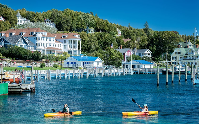 people kayaking on a lake