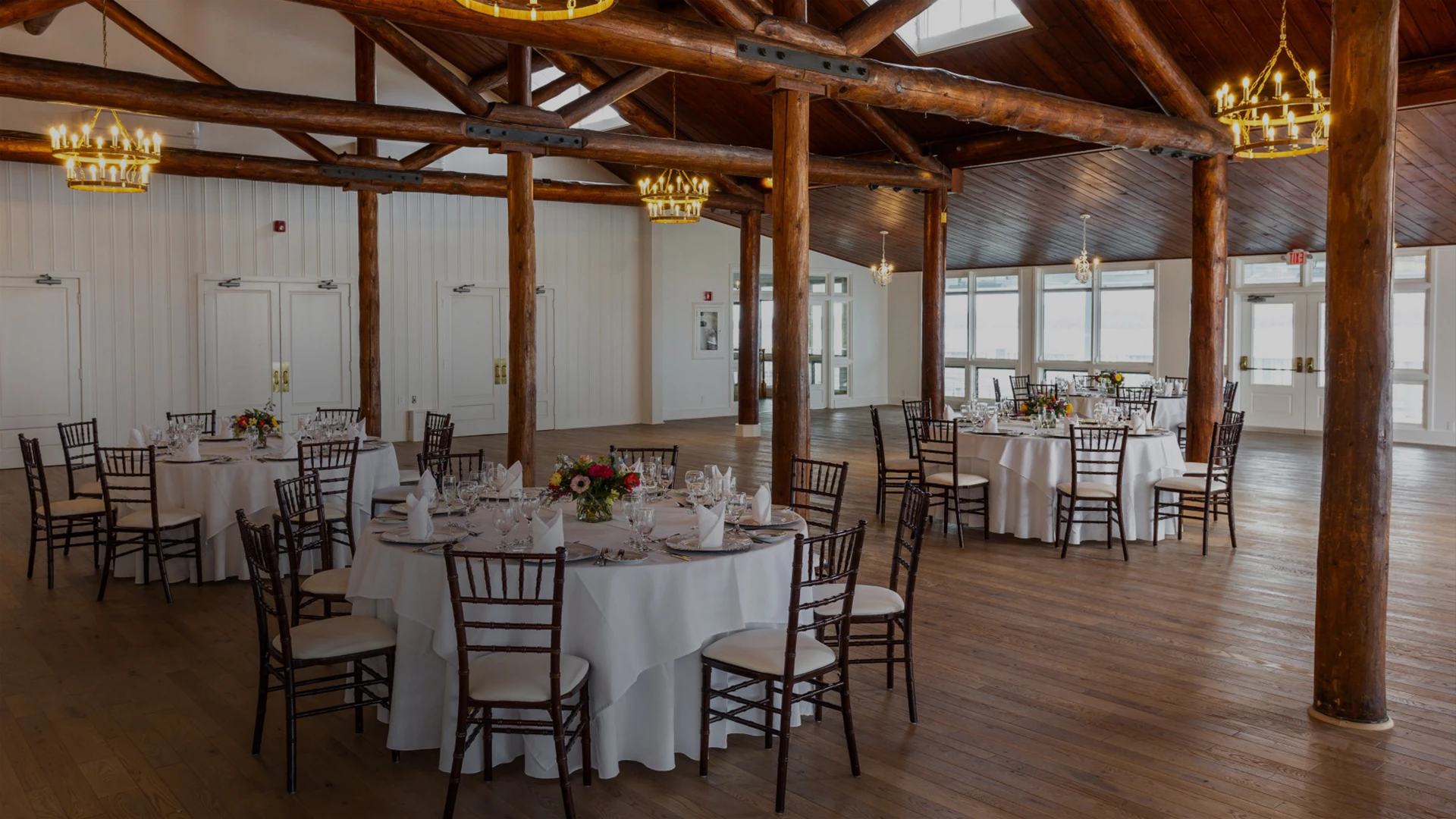 a room with tables and chairs