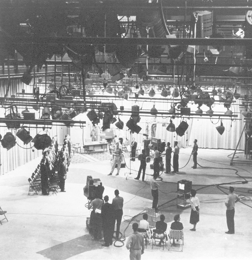 a group of people in a large room