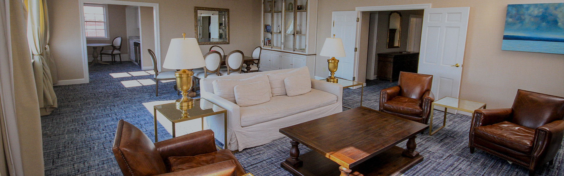 a living room with a couch and table