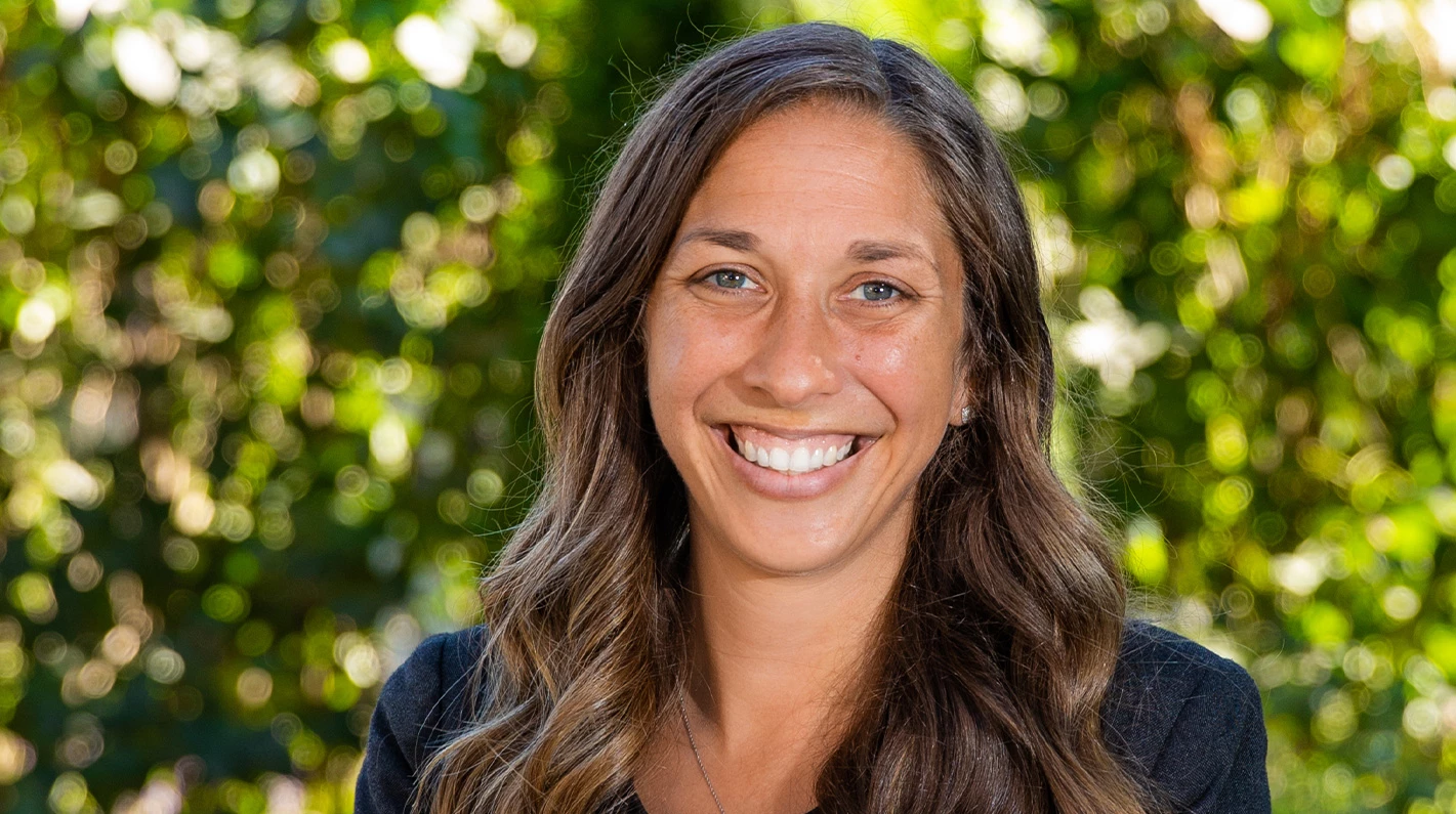 a woman smiling at camera