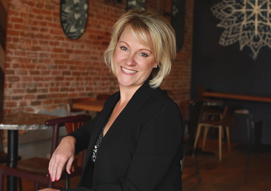 a woman smiling at camera