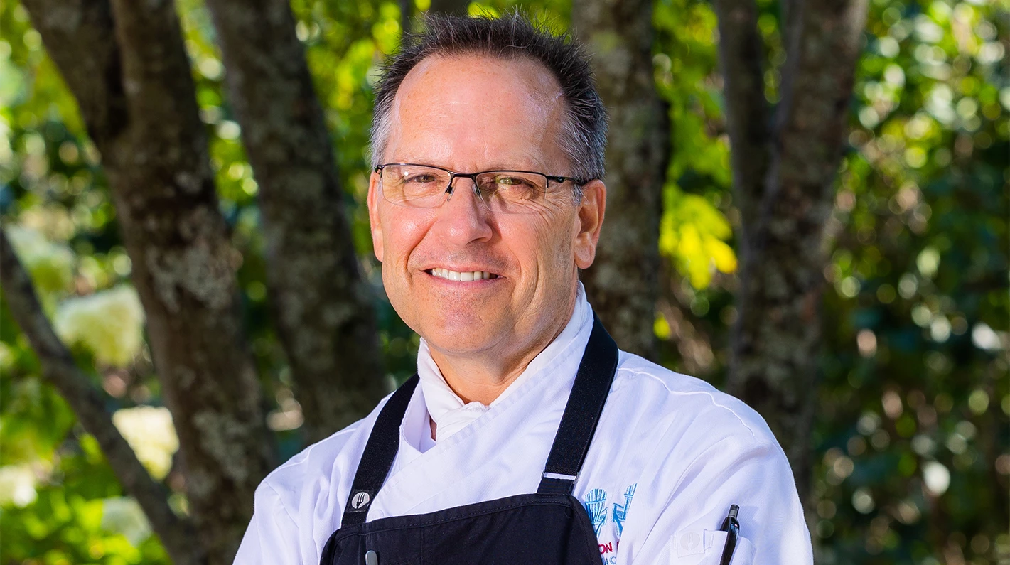 a man wearing a chef's apron